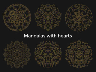 Set gold mandalas with hearts. Collection symmetric circular