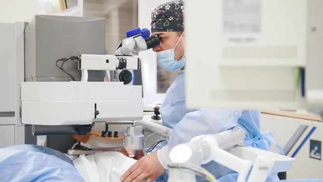 Doctor at ophthalmology surgery - laser vision correction