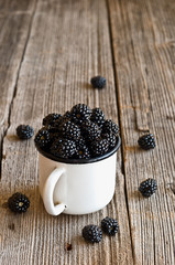 Fototapeta na wymiar Blackberries on a mug