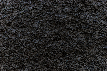 Grain dark painted wall texture background, black background