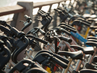 Public and private bicycles at bicycle parking spot; city of Shenzhen, People's republic of China