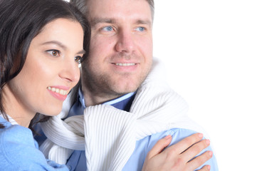 Happy young couple on a white background