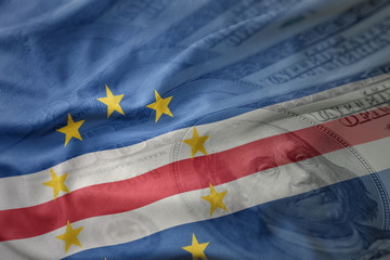 colorful waving national flag of cape verde on a american dollar money background.