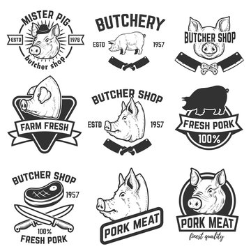 Set of pork meat labels. Butcher shop. Pig heads. Design elements for logo, label, emblem, sign. Vector illustration