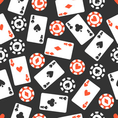 Casino pattern with playing cards and chips on a dark background. 