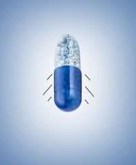 Blue capsules and pills background