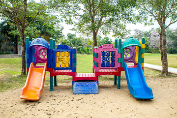 play ground colorful big plastic toy set for children school or garden park playground, playground on day noon light in city park.