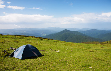 Tourist tent on an Alpine meadow in the Carpathians