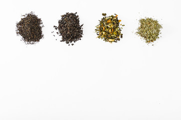 Several kinds of tea leaves black green collection different white background