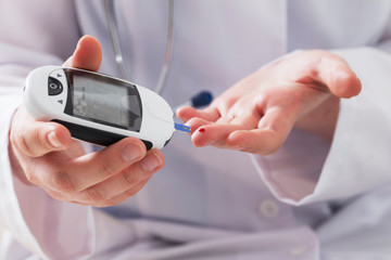Fototapeta premium measuring blood sugar