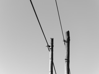 communication road, an old fashion pole with cables and wires, symbol of communication and internet