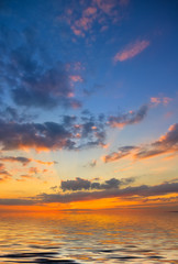 Fototapeta na wymiar Sunset at sea in summer