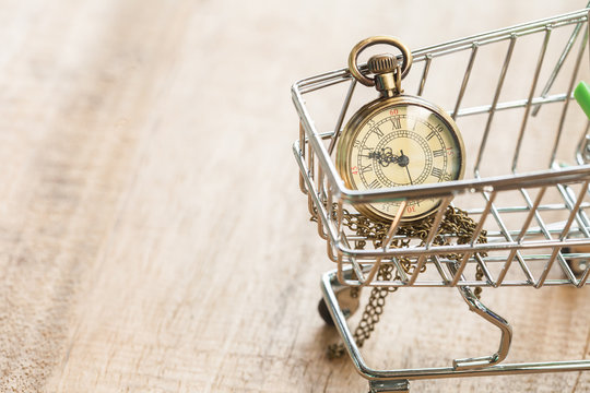 miniature pocket clock in shopping cart