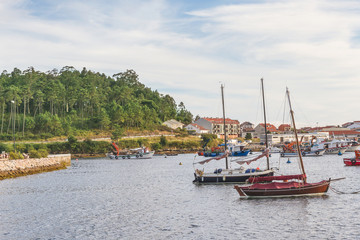 Two sailboats on Xufre fishing port