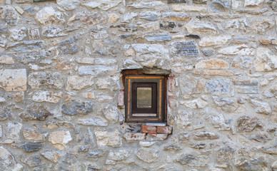 12th-century Serbian Orthodox monastery Studenica (serbian: Manastir Studenica ), Serbia, Unesco world heritage site. Small window in stone wall.
