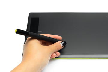 Graphic tablet with pen and hand for illustrators and designers, isolated on white background