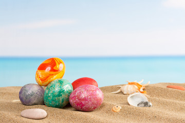 Easter on beach background. Eggs