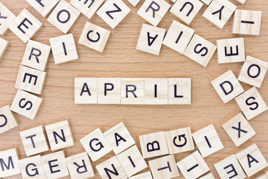 April  words with wooden blocks