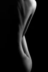 Sexy body nude woman. Naked sensual beautiful girl. Artistic black and white photo. © stasnds