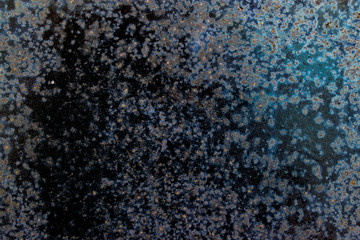 Texture of old rusty metal with remnants of paint
