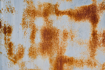 Texture of old rusty metal with remnants of paint