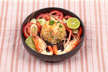 Fried Jasmine rice with large prawns in heart shape.