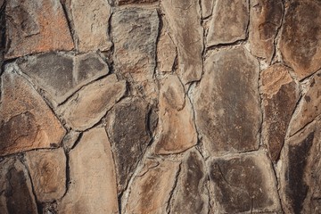 Stone wall. Outdoor background natural stone. Macro shot.