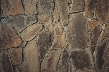 Stone wall. Outdoor background natural stone. Macro shot.