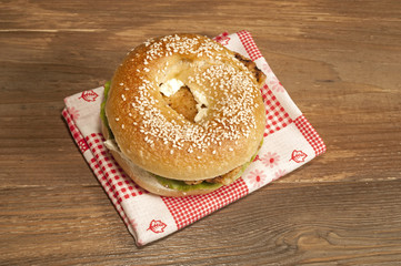 A chicken sandwich on a bagel
