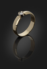 gold ring with a diamond