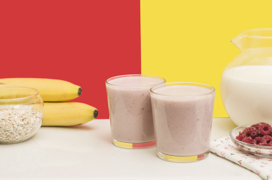 Useful banana smoothie with oatmeal and raspberry berries. Bright and healthy breakfast