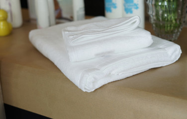 Fototapeta na wymiar White towel is a fine cloth used after bathing.