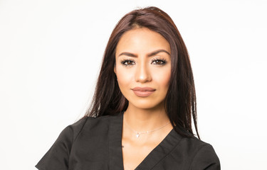 Attractive woman wearing scrubs for role in multiple career choices such as beautician or care...