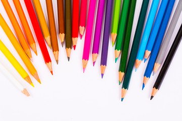 Colored pencils pattern isolated on white background