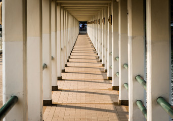 Port corridor,many columns and Shadows in the afternoon