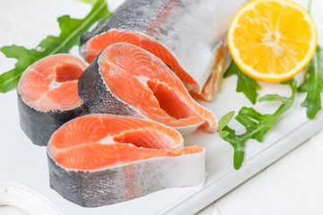 red fish with lemon and arugula