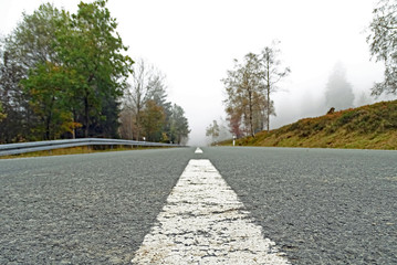 Misty mountain road in the Sauerland, Germany