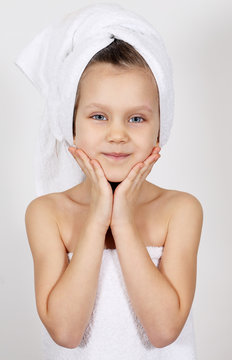 Little girl with a towel