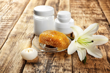Beautiful honey spa composition on wooden table