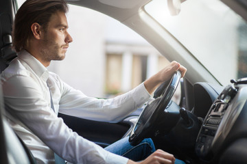 Man driving his car