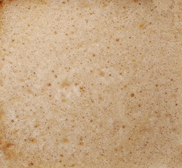 close up of foam coffee with bubbles texture and background, top view