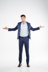 Full length portrait of Incomprehensible business man