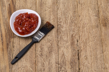 Barbecue sauce with basting brush