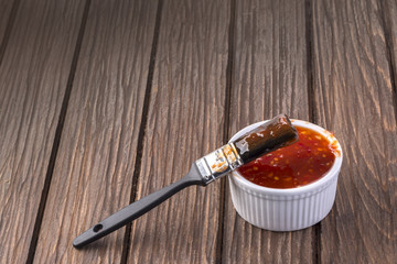 Barbecue sauce with basting brush