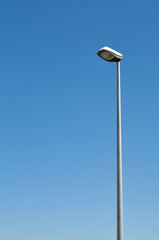 Simple streetlight with a blue sky background