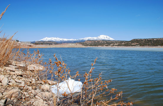 Abajo Mountains And Winter Lake In Utah