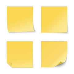 Set of vector yellow paper stickers on white background. Four realistic sticky notes. Various blank sheets with curled corners.