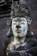 Obraz premium Stone sculpture on entrance door of the Temple in Bali