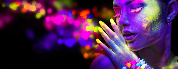 Beauty woman in neon light, portrait of beautiful model with fluorescent makeup