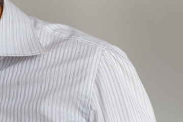 Leche and collar of a representative white shirt. Marvelous work of tailor
